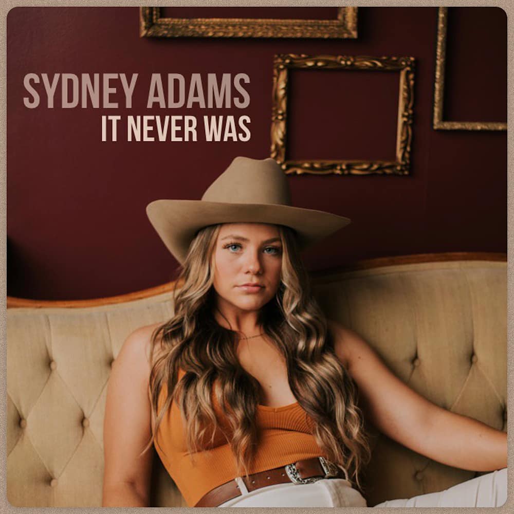 Sydney Adams Shows Off Her Country Rocking Side on New Single “It Never  Was” – Pro Country